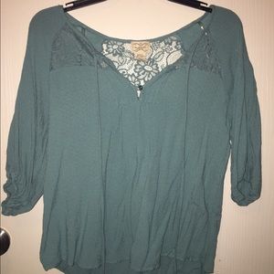 Teal quarter length sleeve blouse